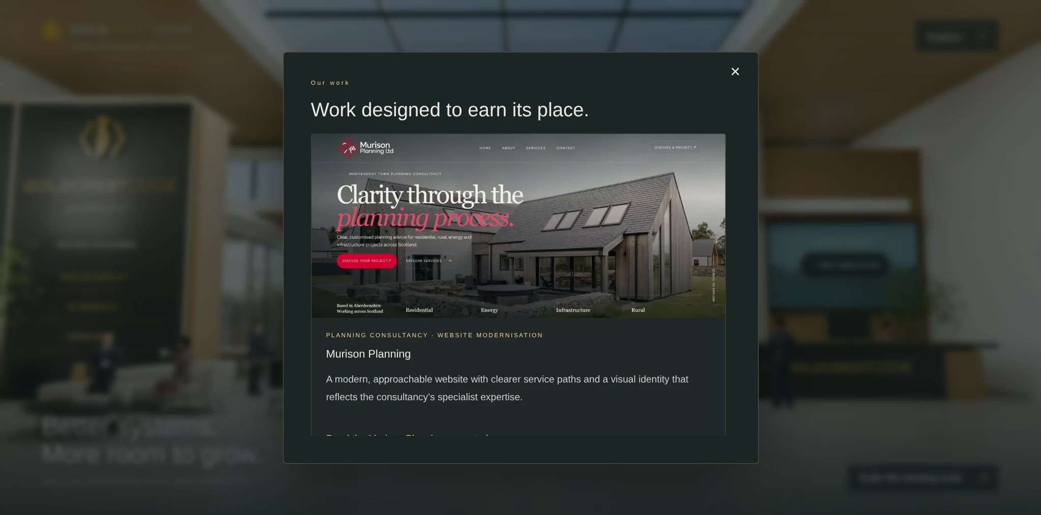 The GoldcrestCode atrium with its interactive work display open on the genuine Murison Planning website project